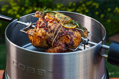 Close up of Cobb Rotisserie kit cooking a chicken