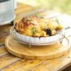 Bamboo Cobb Cutting Board with pie resting on top